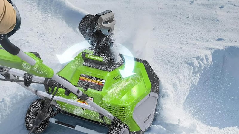 A close-up of the chute on a snow blower.
