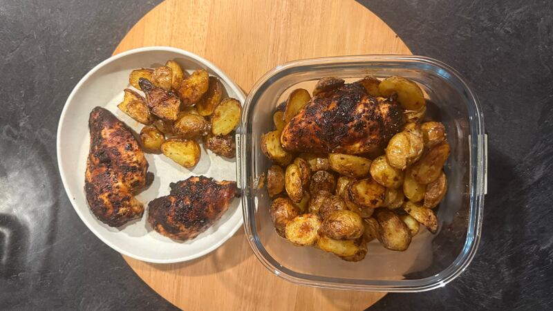 the chicken and potatoes in the crispi and on a plate